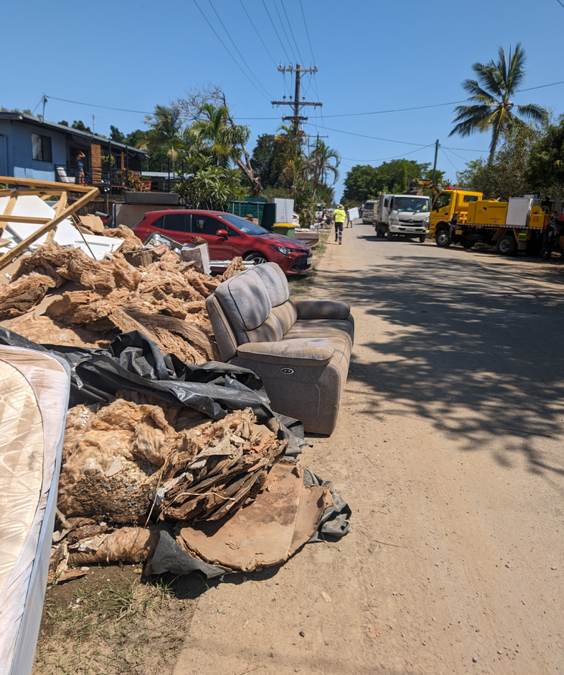 Flood-affected households left damaged contents in streets for council collection. Image: Yetta Gurtner